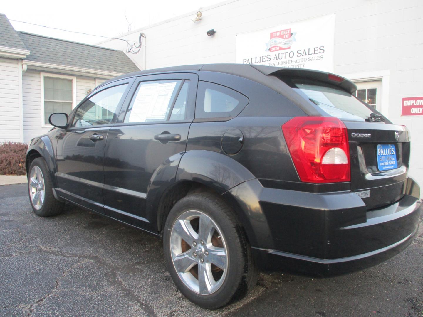 2011 BLACK Dodge Caliber Uptown (1B3CB9HB0BD) with an 2.4L L4 DOHC 16V engine, Continuously Variable Transmission transmission, located at 540a Delsea Drive, Sewell, NJ, 08080, (856) 589-6888, 39.752560, -75.111206 - Photo#2